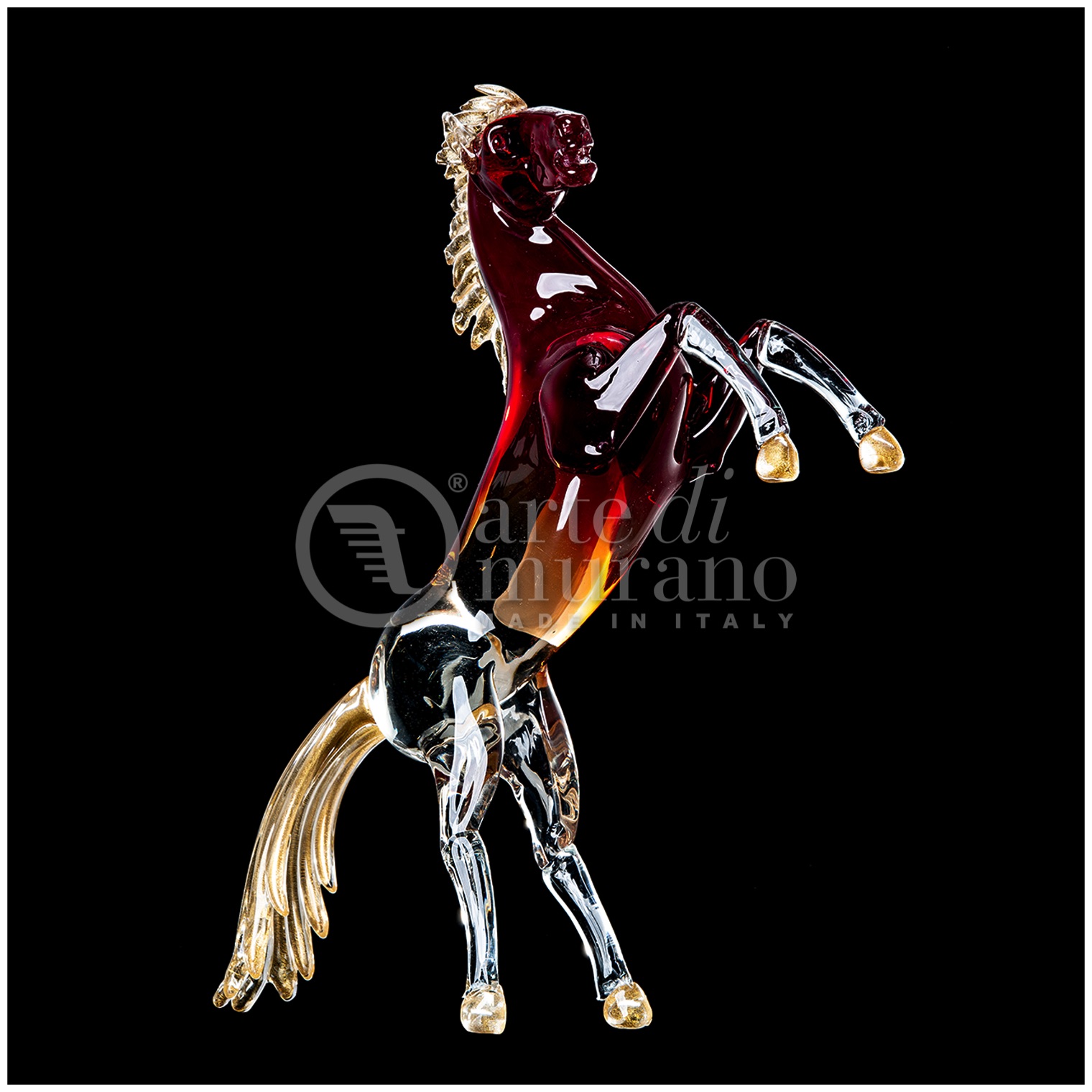 Scultura in vetro di murano raffigurante un cavallo rampante cristallo sfumato con colore/dettagli oro L.55cm-L.16cm-H.60cm