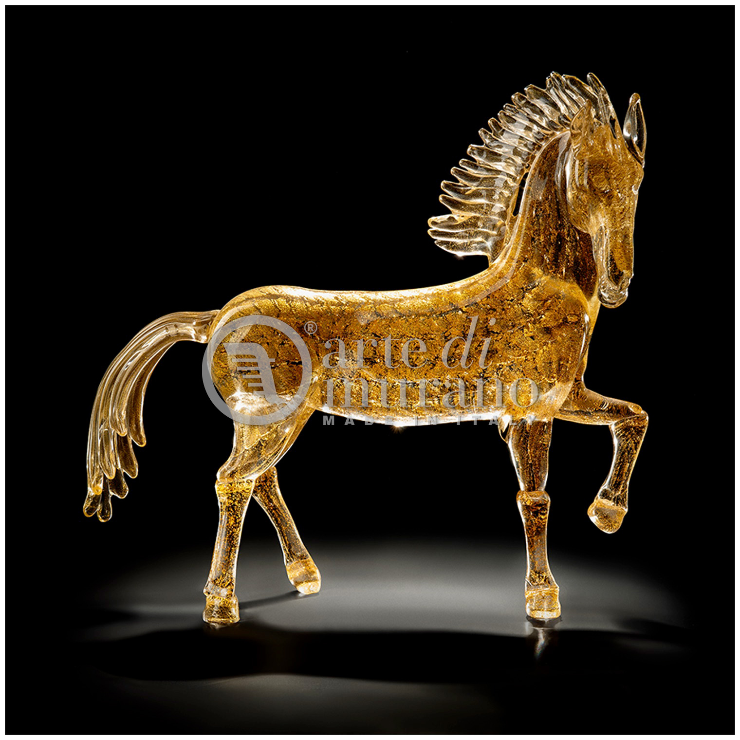 Scultura in vetro di murano raffigurante un cavallo al trotto tutto oro L.30cm-L.13cm-H.30cm