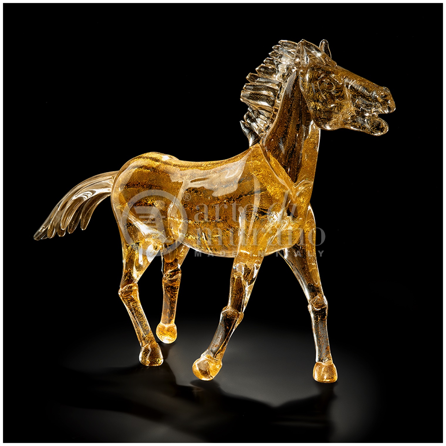 Scultura in vetro di murano raffigurante un cavallo in corsa tutto oro L.60cm-L.20cm-H.45cm